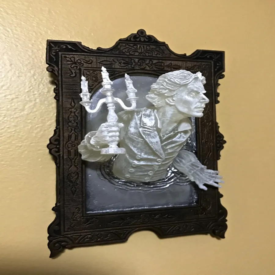 Spooky Wall Sculptures Ofvictorian Ghosts Emergingfrom A Mirror