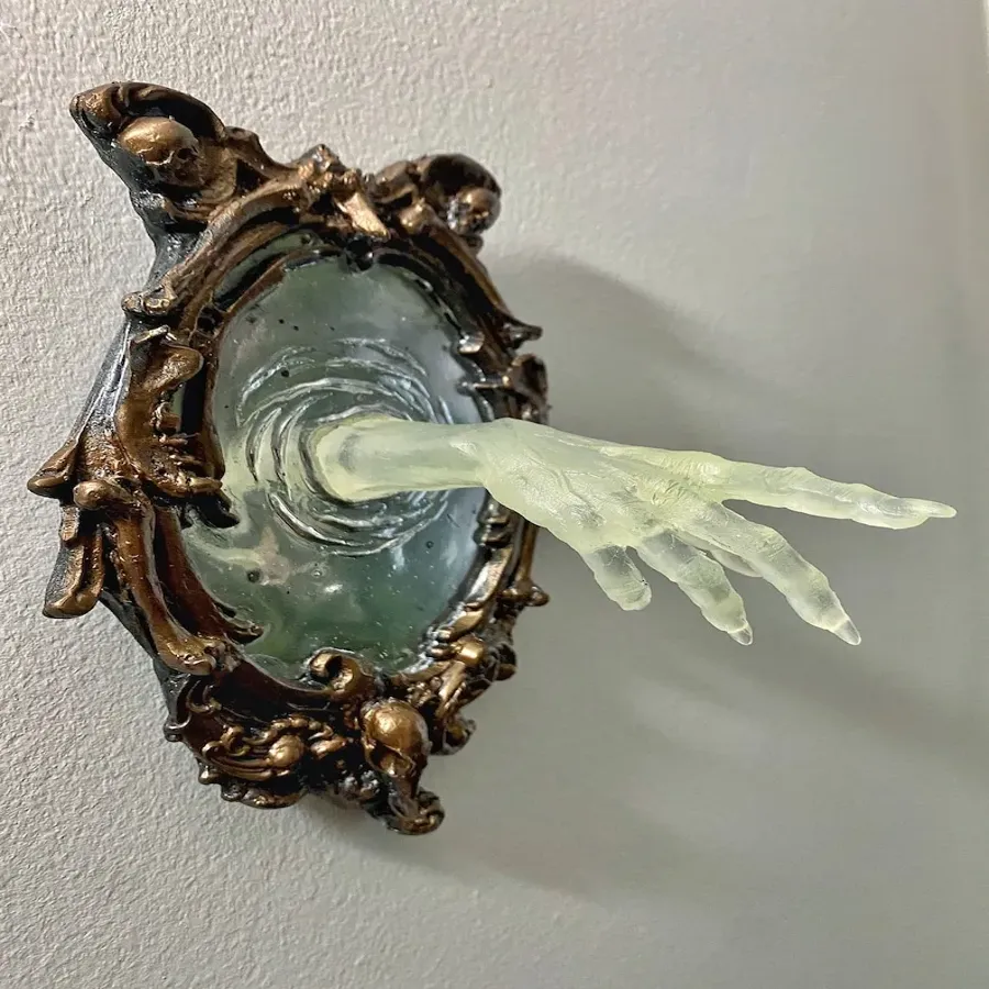 Spooky Wall Sculptures Ofvictorian Ghosts Emergingfrom A Mirror